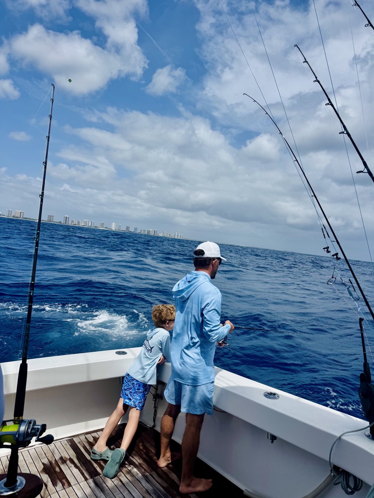 Kyle Sherman fishing offshore of Palm Beach with his son